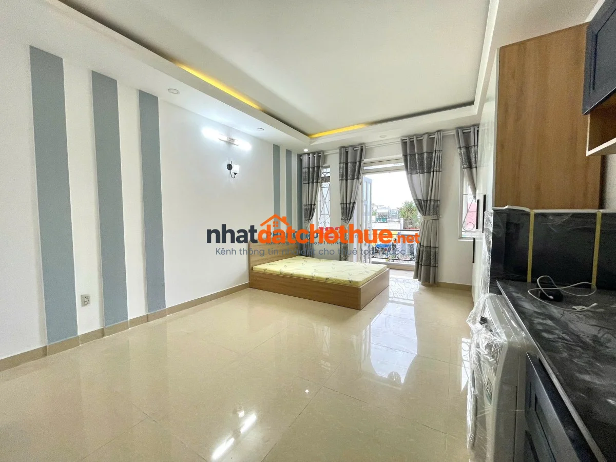 Cho thuê phòng siêu rộng ~50m², ban công lớn, máy giặt riêng – Phan Văn Trị, Bình Thạnh gần VLU, IUH